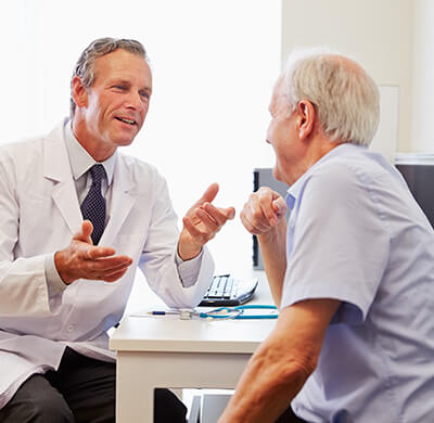 Ophthalmologist discussing Medical Billing with a patient