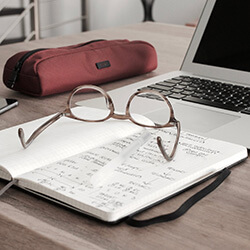 Glasses and a Laptop Computer - billing for ophthalmology services